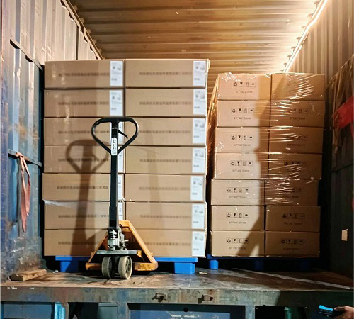 Reinforced 5-ply export master cartons palletized and loaded into ocean freight container